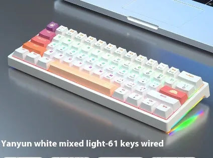 Bluish black 61-key compact mechanical keyboard with hot-swappable sockets and coloured keycaps.