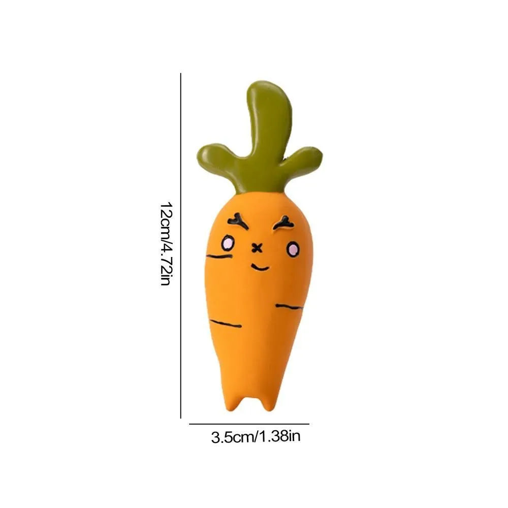 Green latex dog chew toy shaped like a cartoon onion, next to a purple eggplant-shaped chew toy.