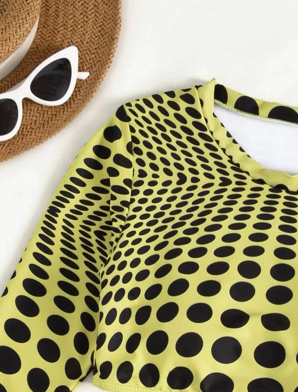 Women's green polka dot swimsuit three-piece set showing top, skirt, and bra.