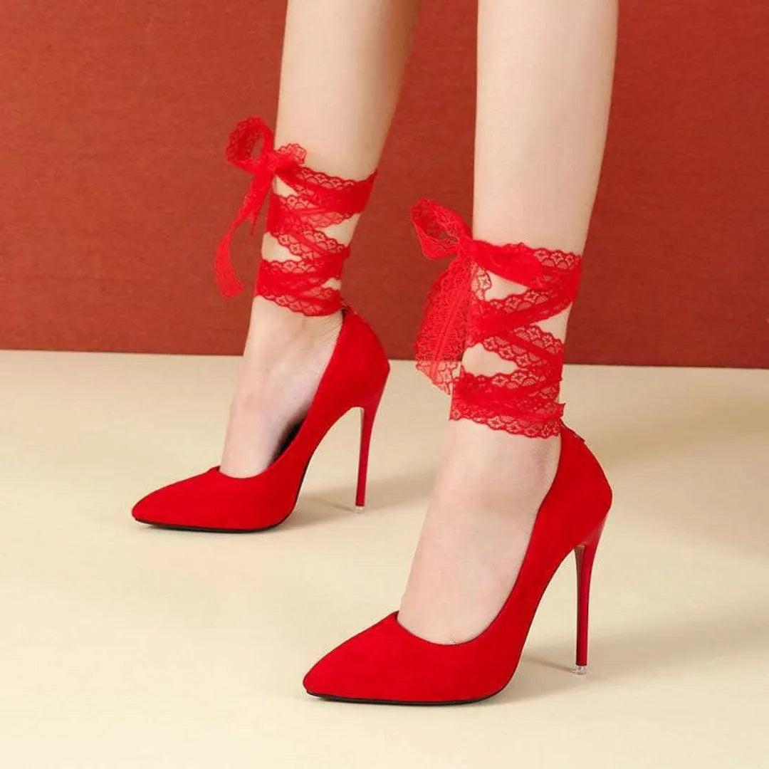 Women's black pointed toe high heels with lace strap and buckle closure