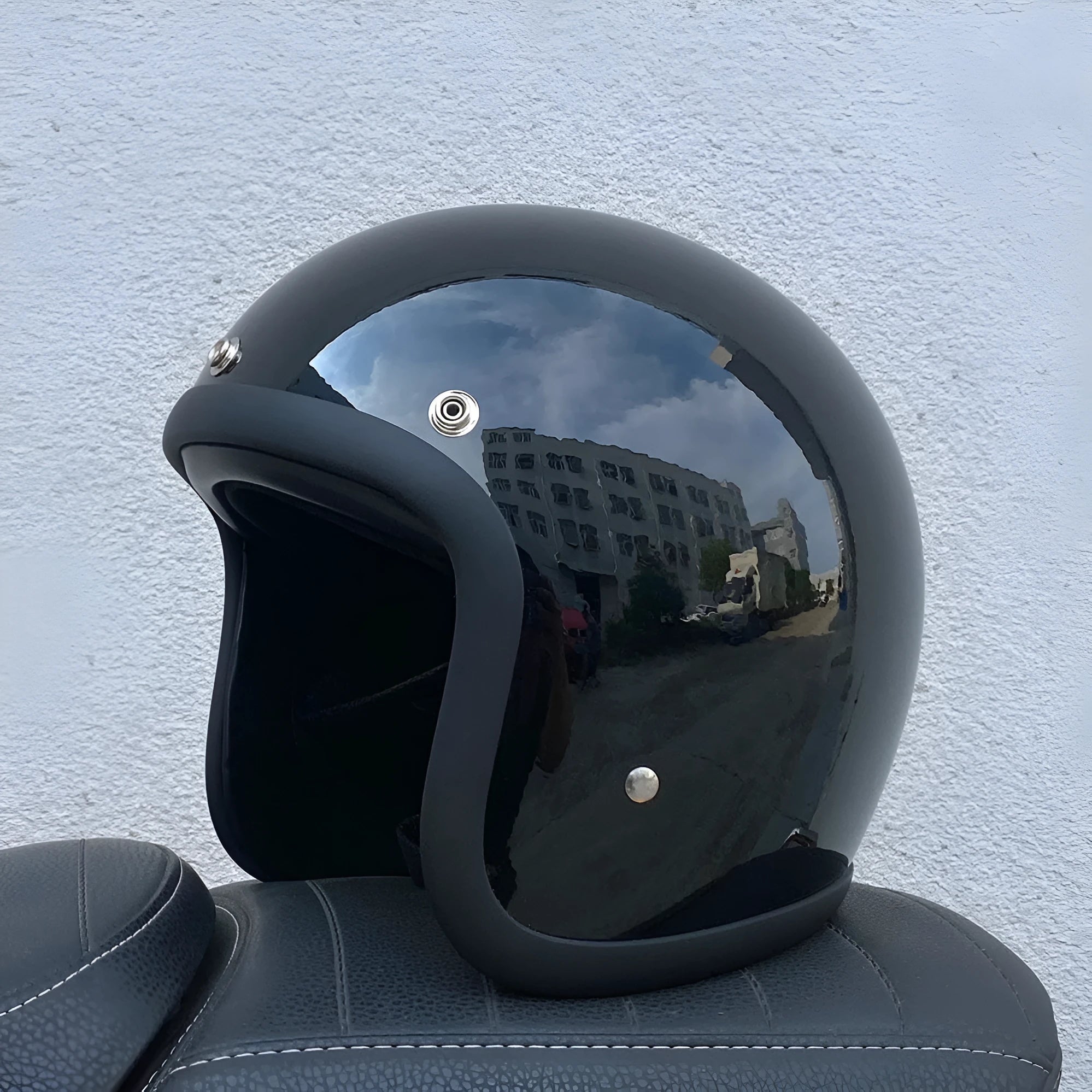 FRP fibreglass motorcycle half helmet shown in cement grey colour, suitable for electric bike commuting.