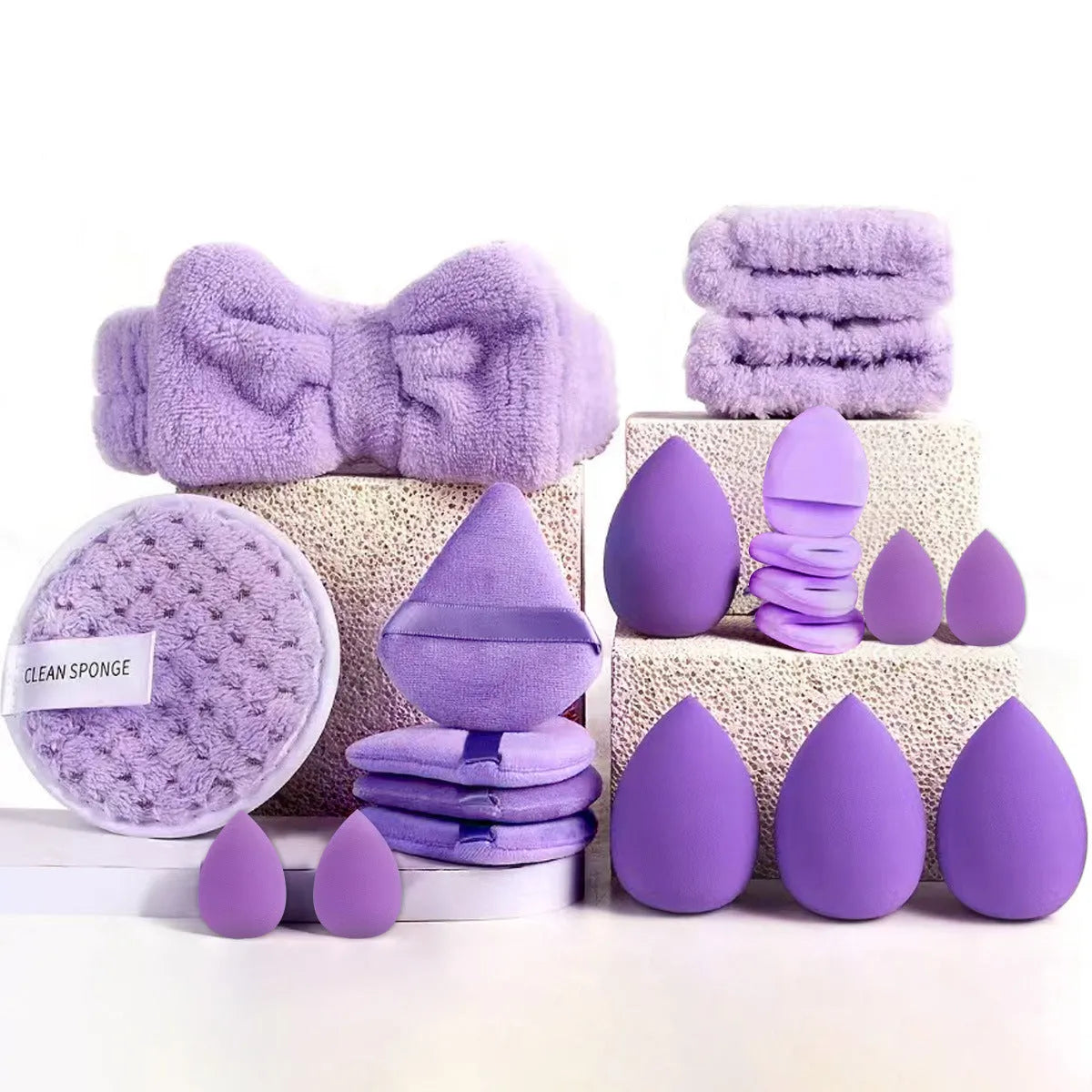 Beauty tool combination set with hydrophilic non-latex material in brown, pink, and purple colours