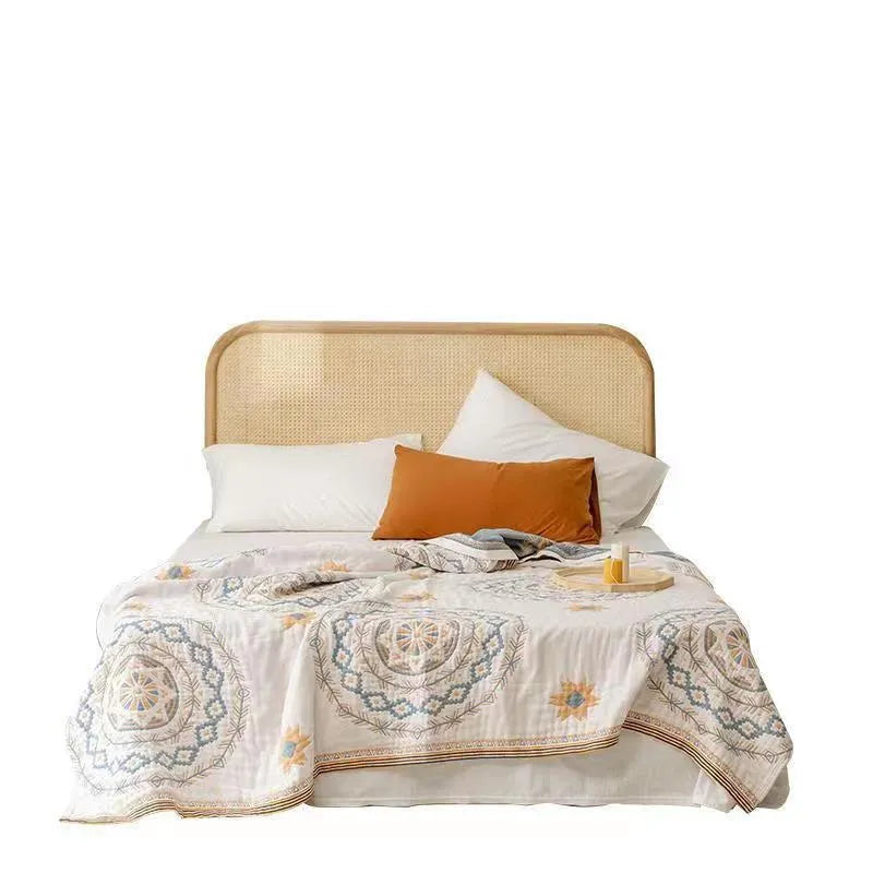Cotton towel blanket with geometric pattern shown in two size options: 180x200cm and 200x230cm.