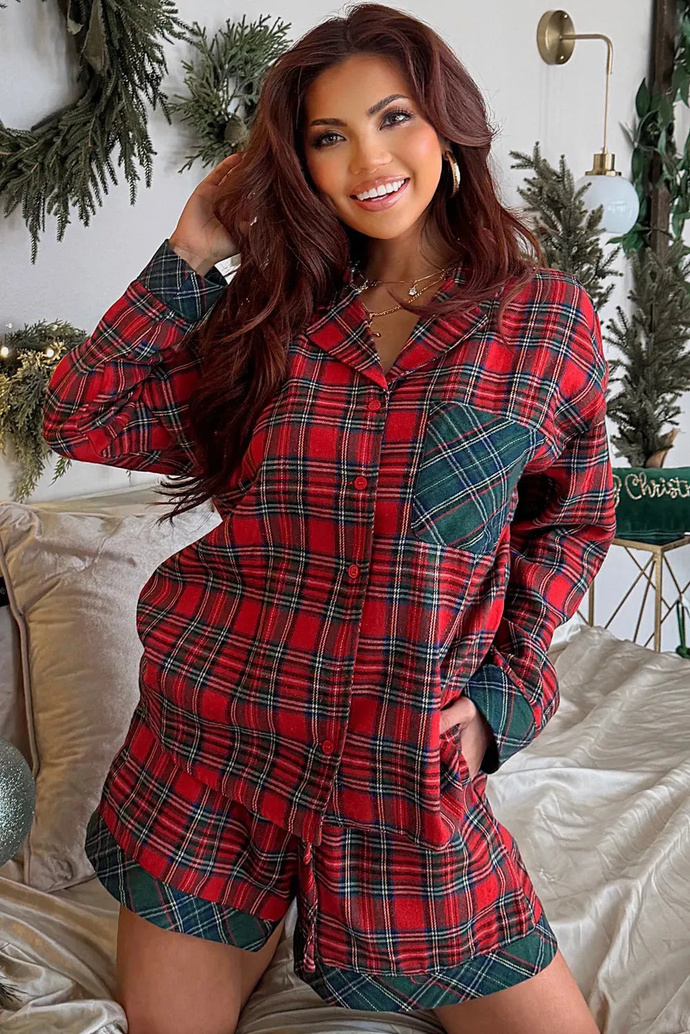 Red plaid long sleeve shirt and shorts from a men's Christmas pajama set.