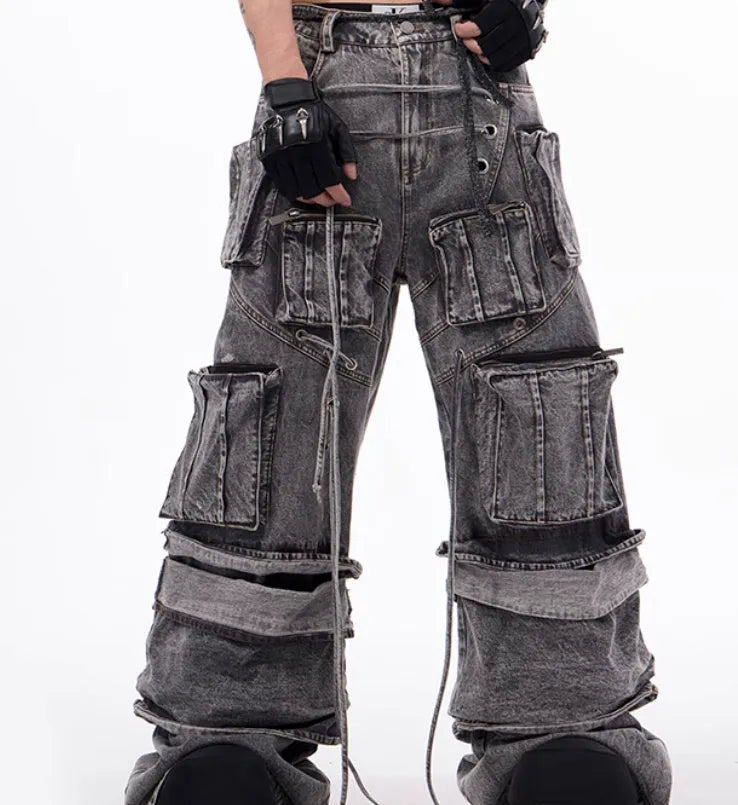Grey distressed denim overalls with rope stitching detailing in American-style design