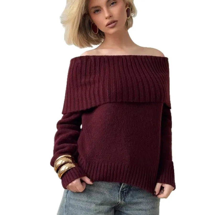 Grey off-the-shoulder strapless sweater with a raised 3D pattern texture.