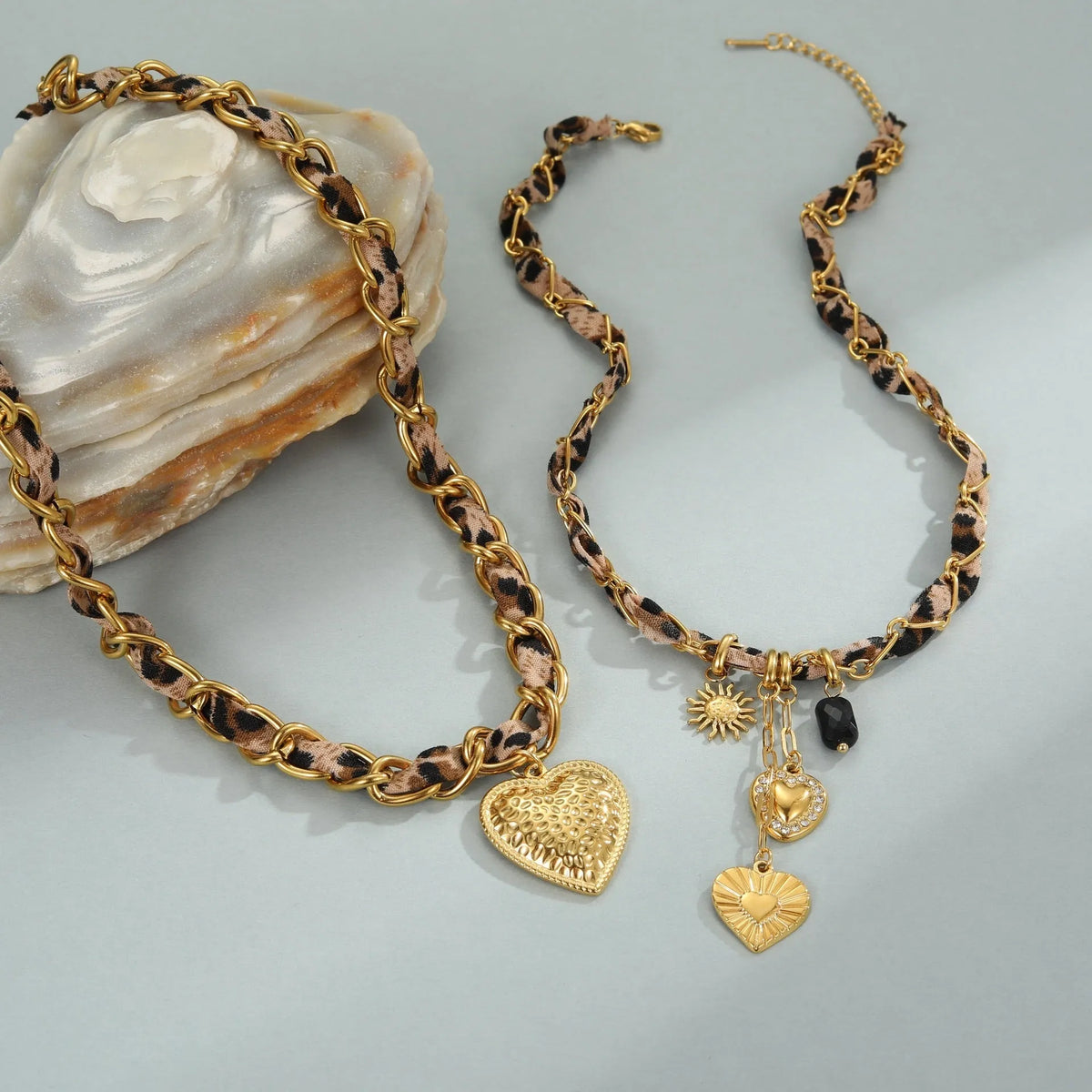 Geometric leopard love design pendant on a stainless steel necklace with an adjustable 41-50cm chain.