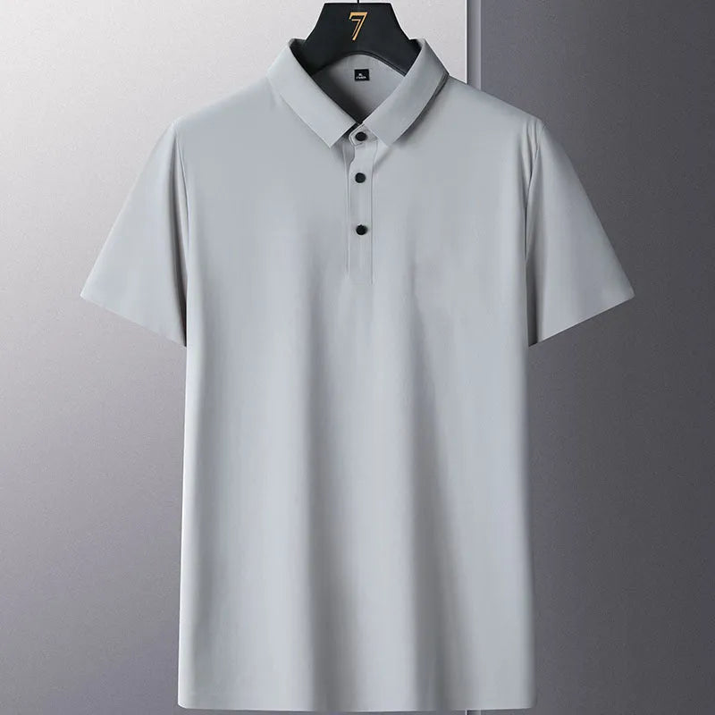 Man wearing a solid colour short sleeve non-iron business casual shirt in a professional setting.