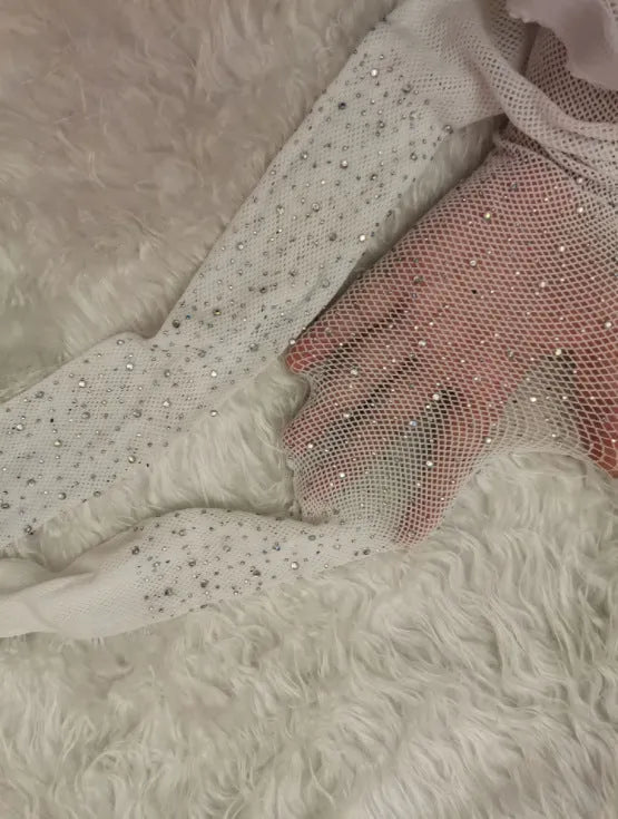 Women's mesh fishnet stockings in free size, showing thin nylon construction in skin colour option
