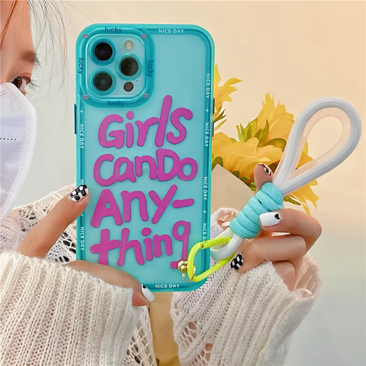 Graffiti artwork phone case for iPhone with lanyard attachment in mint green colour