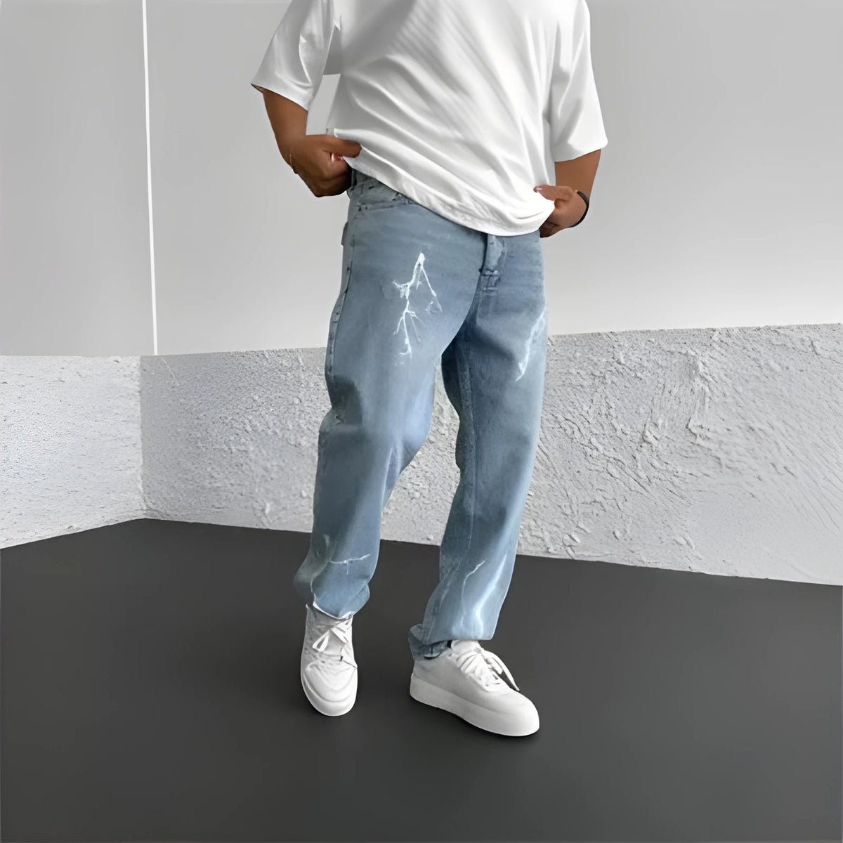 Men's blue straight-leg cotton denim jeans with loose fit and mid-waist design