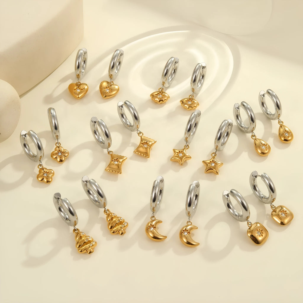 Christmas tree shaped heart earrings with star motifs in gold electroplated stainless steel