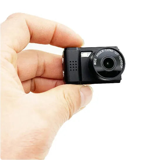 Thumb camera with 0.9 inch screen, 8MP, optical anti shake, in black SLR, pink SLR, or white.