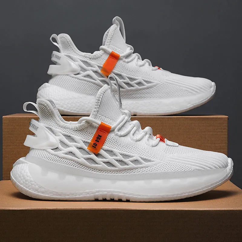 Men's white low-top mesh sneakers with flat rubber sole and front lace-up design on a neutral background.