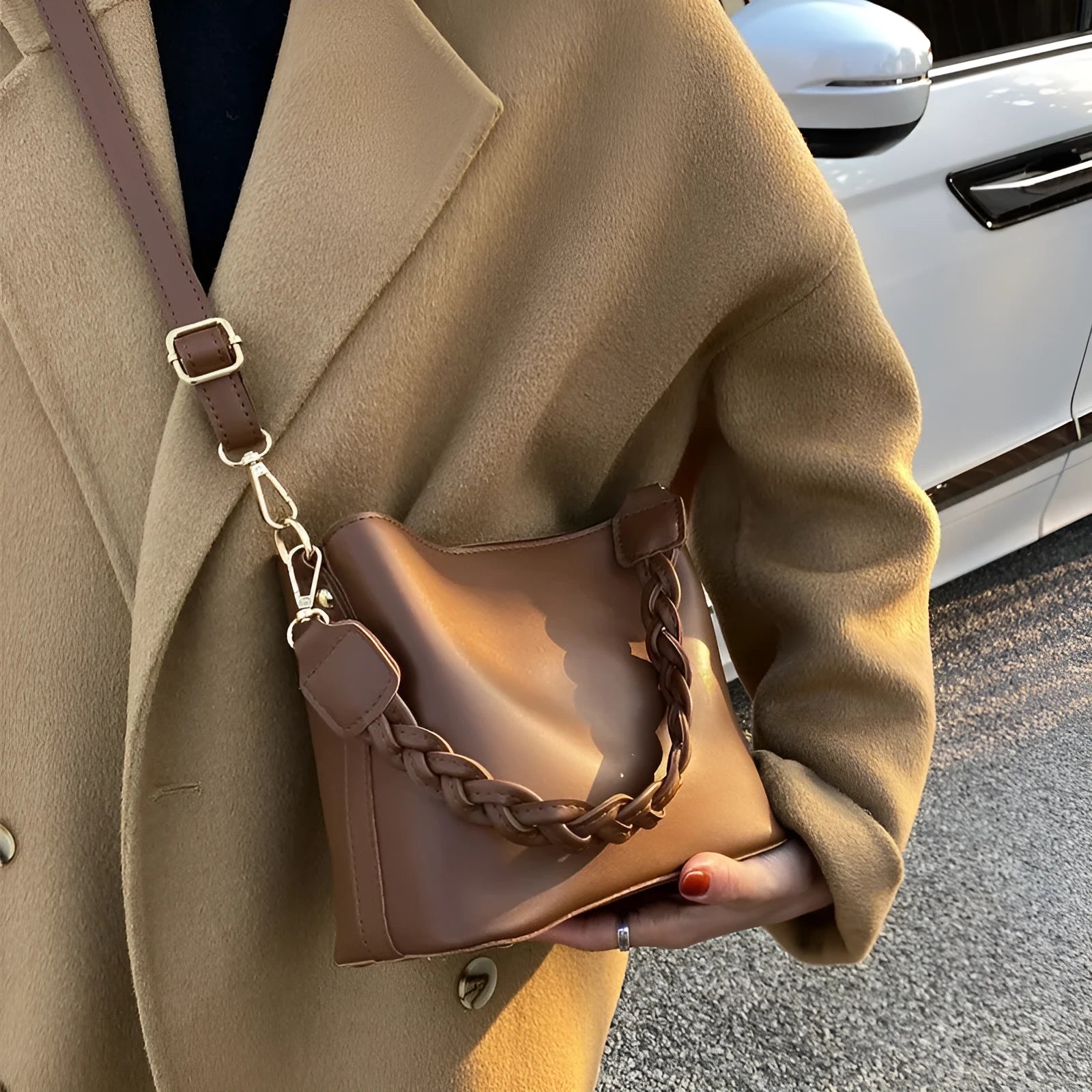 Retro unisex woven PU crossbody bucket bag shown in khaki colour.