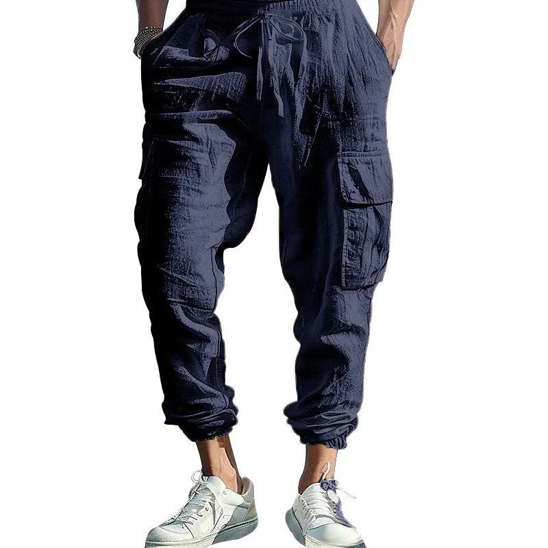Men's linen casual trousers with ankle drawstring and multiple pockets in solid colour