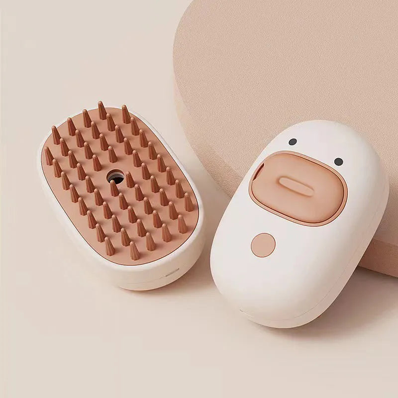 White or yellow rechargeable pet steam brush for grooming dogs and cats.
