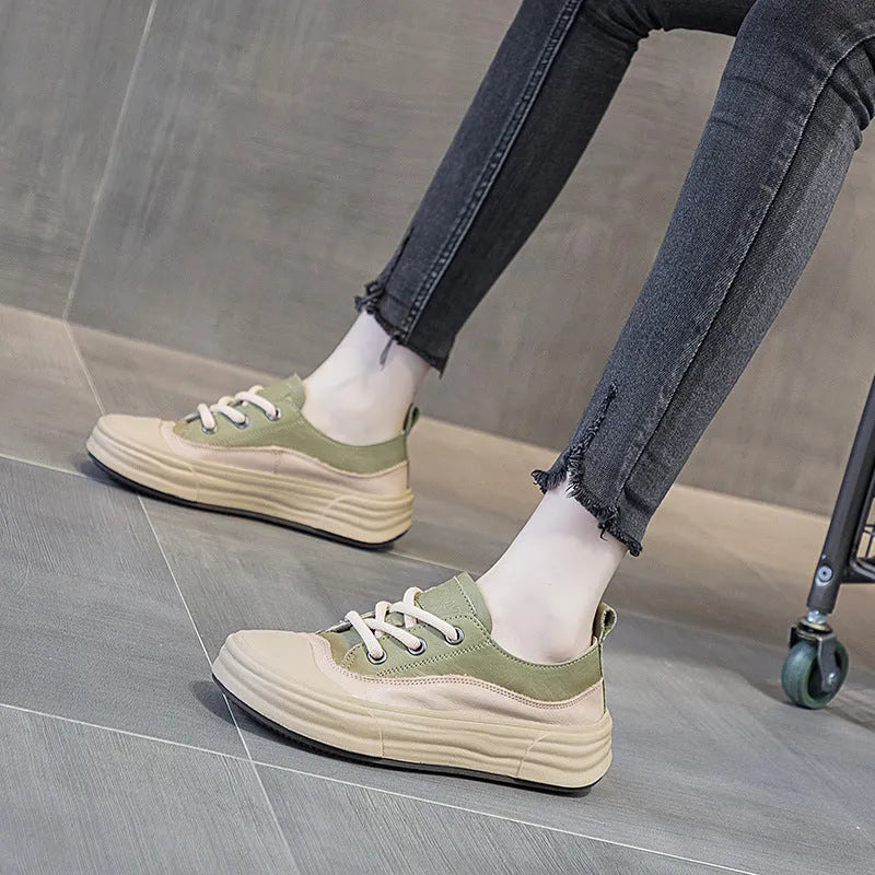 Women's matcha green platform sneakers made from cowhide with a lace-up front and pigskin lining.