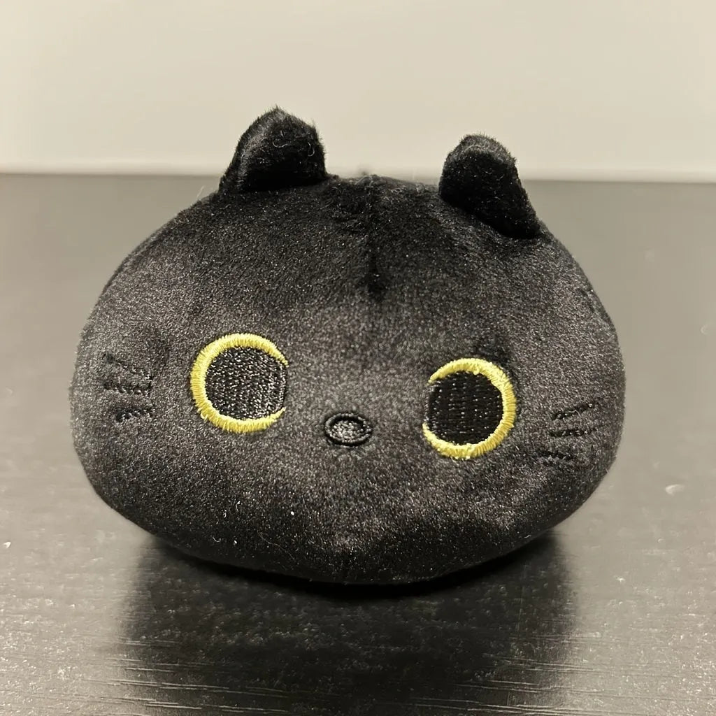 Fluffy black cat plush toy pillow cushion measuring 35 cm in length