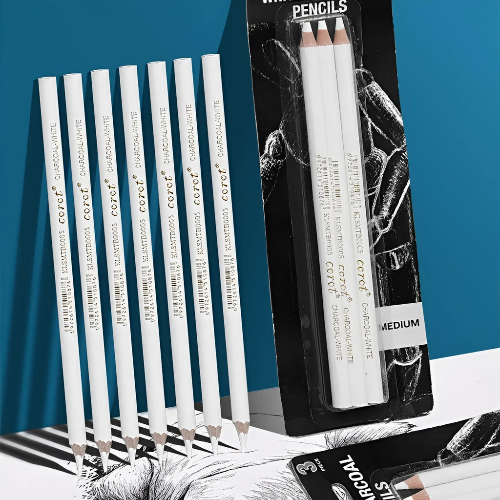 Three white charcoal pencils in wooden casings for drawing highlights on dark paper