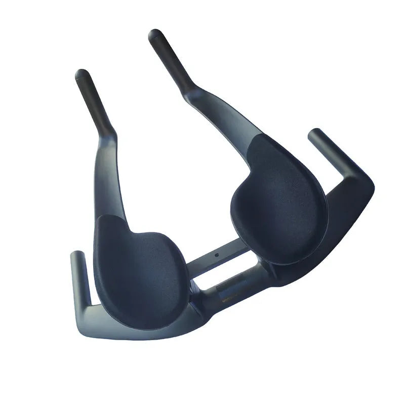Black carbon fibre time trial bicycle handlebar showing aero extensions and 31.8mm clamp area
