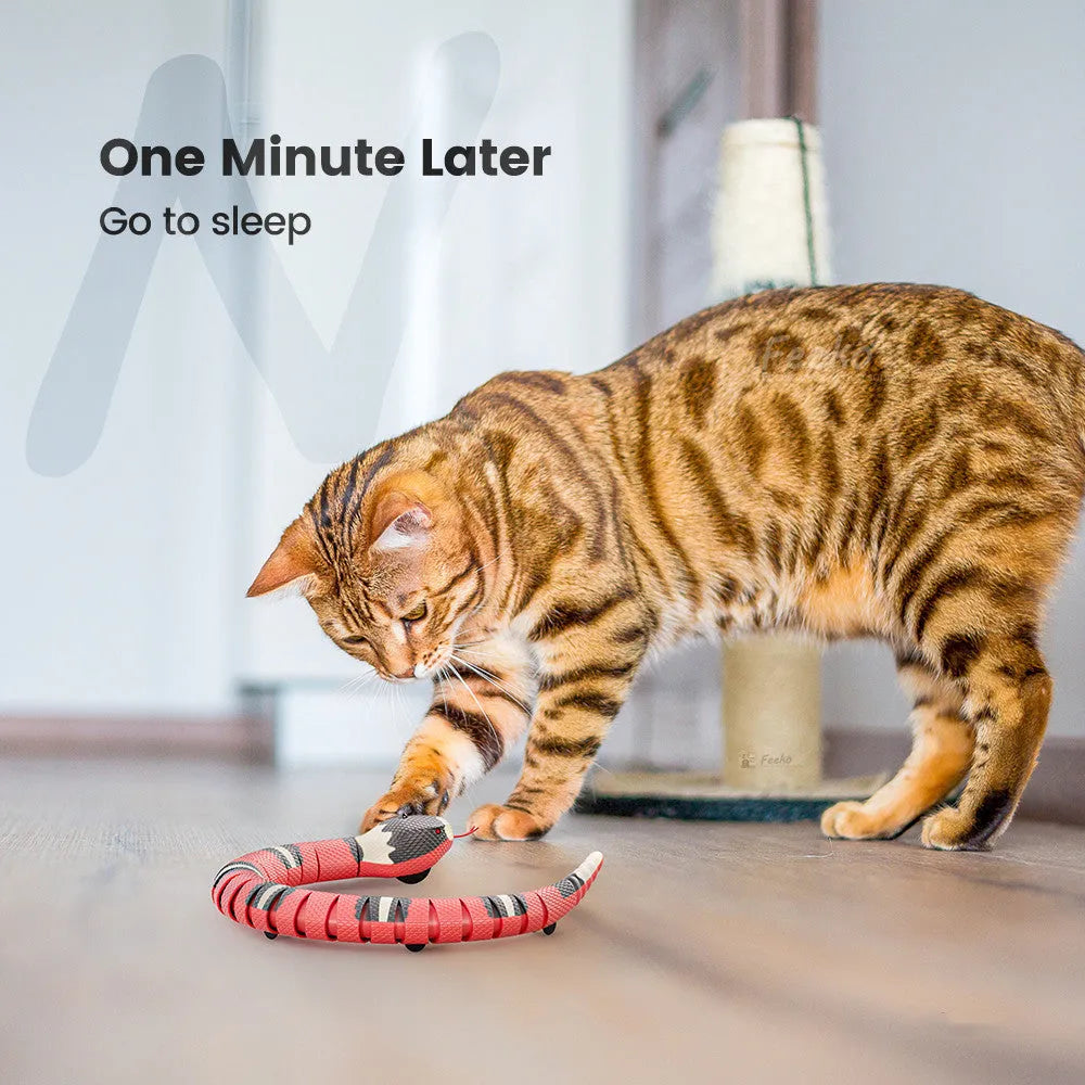 Tricky interactive sleeping electric induction snake toy in plastic, 40cm long, realistic snake prop for pranks.