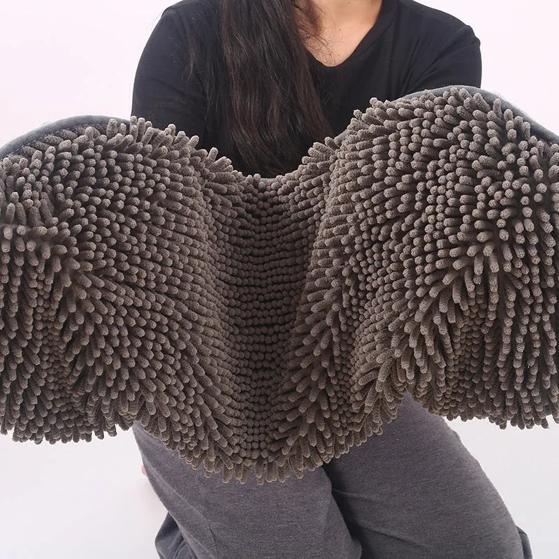 Grey chenille pet towel made from fibre for drying dogs and pets after a bath or swim