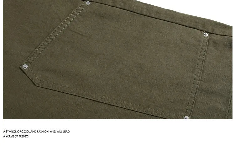 Workwear-style cropped pants with wide-leg design in apricot colour showing mid waist and loose fit