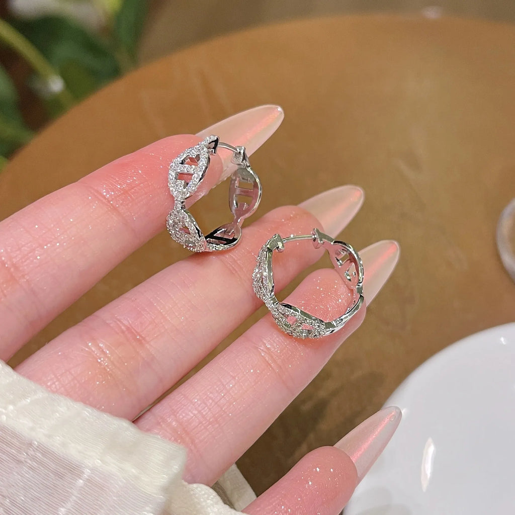Women's casual diamond earrings in electroplated copper with thick gold plating available in silver, gold, or rose gold tones