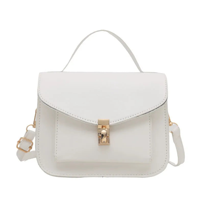 Shoulder messenger bag in horizontal square shape with sewing line detailing and crossbody strap
