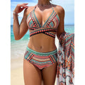 Women's three-piece cross bandage swimsuit with high waist and veil split detail in blue colour variant
