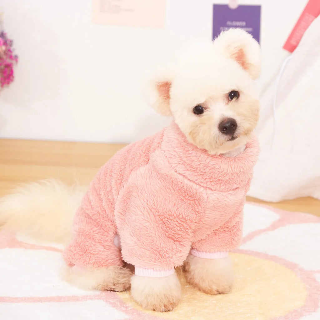 Blue double-sided plush dog clothes with high collar and towing ring on a mannequin.