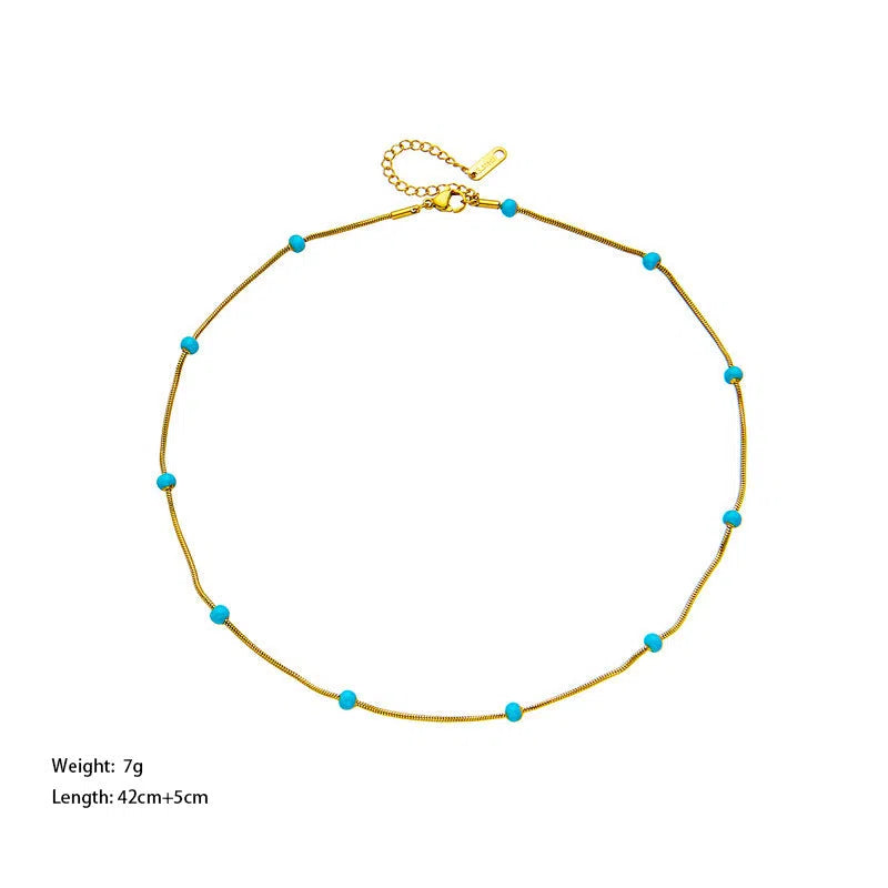 Titanium steel ball drop glaze necklace on stainless steel clavicle chain in Green Pearl Gold