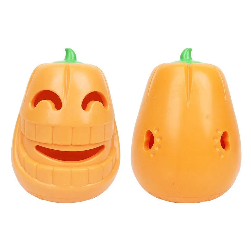 Orange Halloween pumpkin shaped dog chew toy with treat dispensing funnel