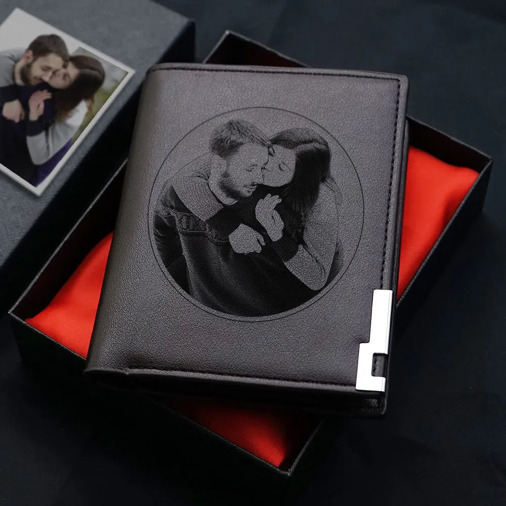 Men's brown leather wallet with a silver zipper closure, shown with individual packaging.