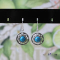 Handmade geometric flower disk earrings with Miao silver and turquoise ethnic design