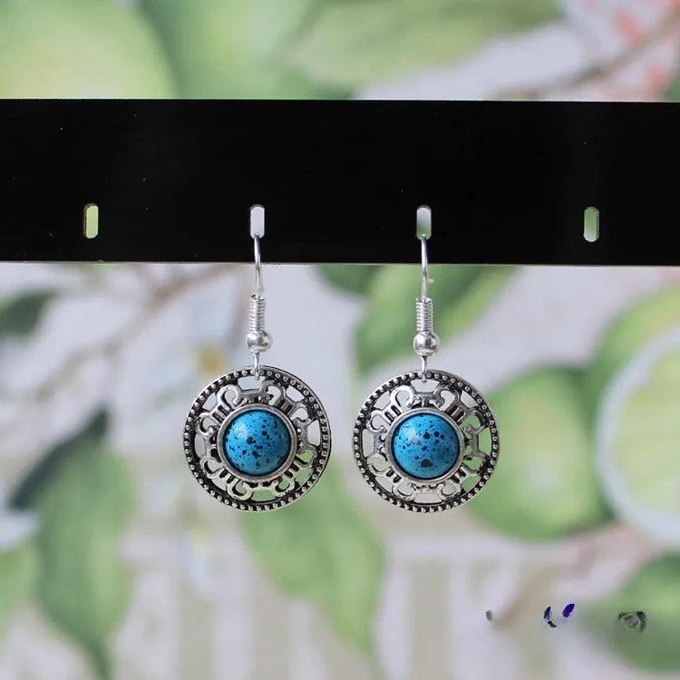 Handmade geometric flower disk earrings with Miao silver and turquoise ethnic design