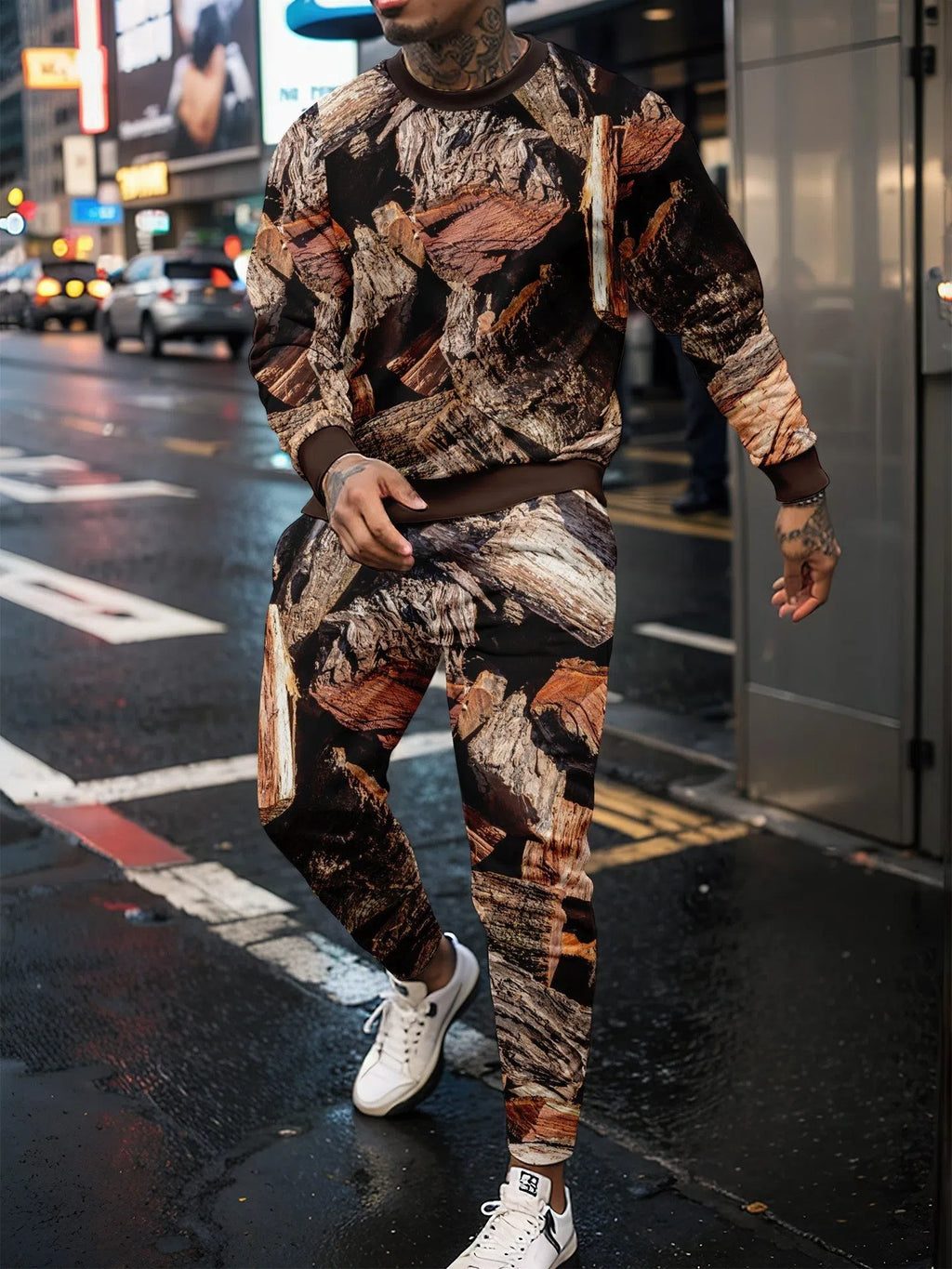 Two-piece jungle camouflage sportswear set with long-sleeve round neck top and matching trousers on a male model