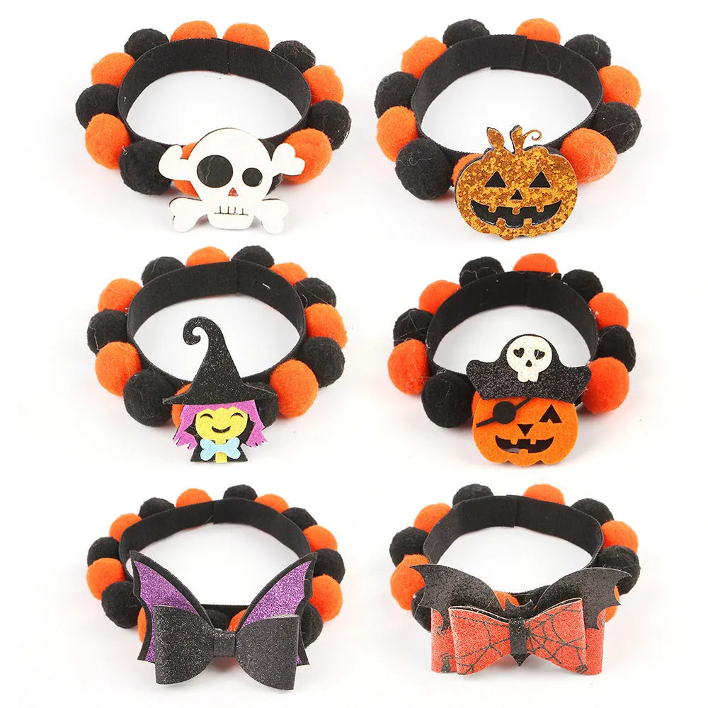 Halloween pet fur ball collar with pumpkin decoration in orange and black festive designs.