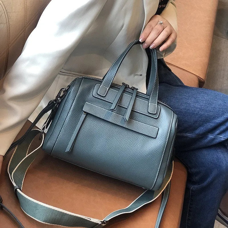 Men's horizontal square leather messenger bag with litchi pattern, shown in elephant grey with shoulder strap.