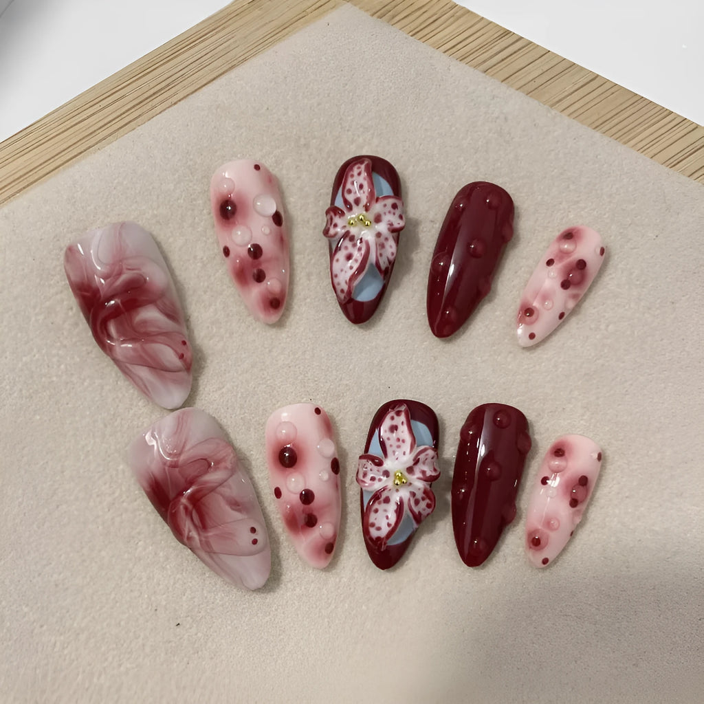 Medium length hand-painted manicure nails with blooming flower 3D carving design in almond colour
