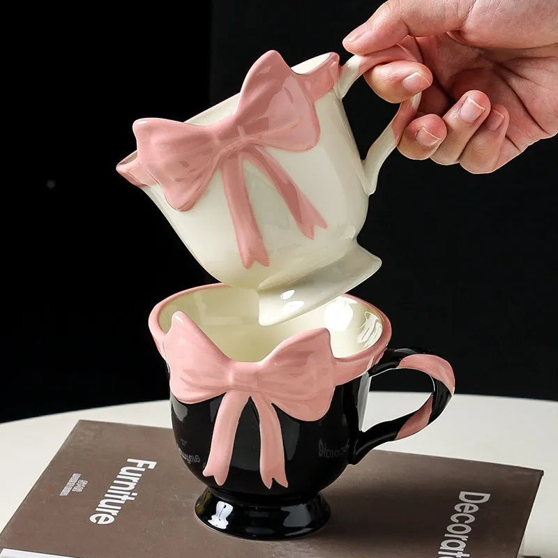 Ceramic heart bow mug with handle in white powder or black pink colour, 330ml capacity