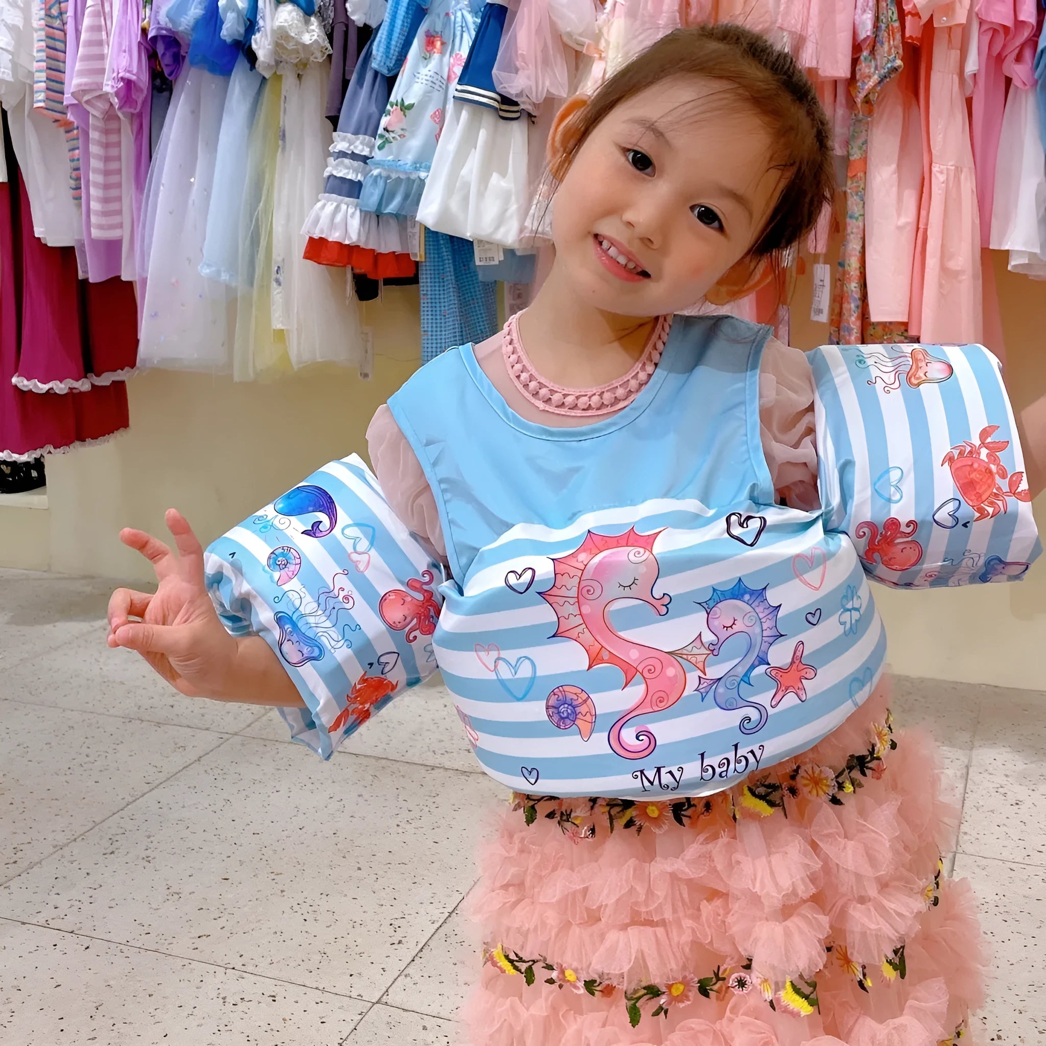 Children's polyester swimsuit with integrated lengthened arm swimming ring in cartoon pattern