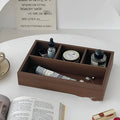 Retro wood desktop grid storage box with four short cells on a desk organising pens and sundries