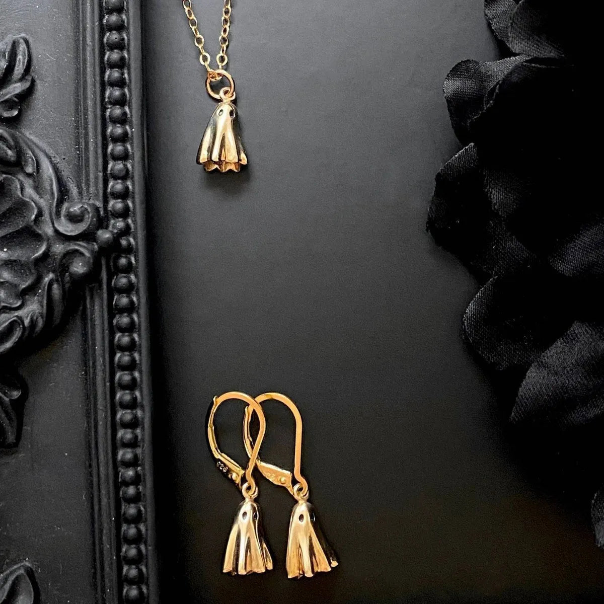 Ghost pendant necklace with stainless steel chain and electroplated titanium steel charm