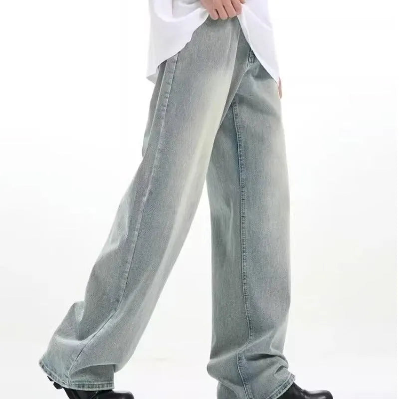Blue loose-fit rabbit fur retro jeans with an elastic waistband on a neutral background.