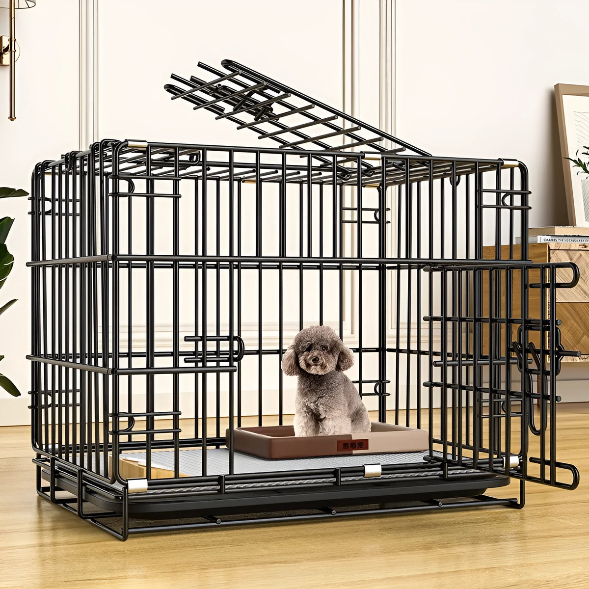 Folding iron wire pet cage in black, blue, or pink, available in five sizes from 35x25x33cm to 85x60x70cm