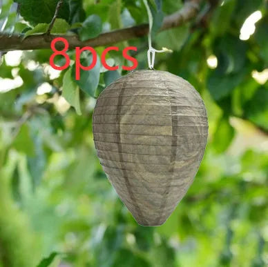 Hexagonal beehive lantern with paper and wire construction measuring 22cm by 28cm