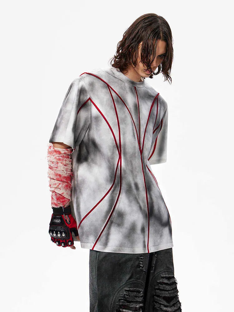 Women's grey padded shoulder t-shirt with 3D line patchwork design on front, short sleeves, round neck.
