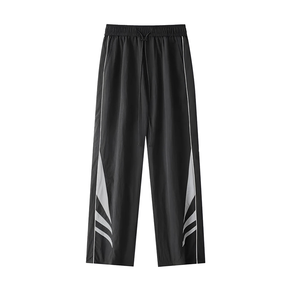 Men's straight leg casual trousers in grey, featuring an elasticated waistband and a loose fit.